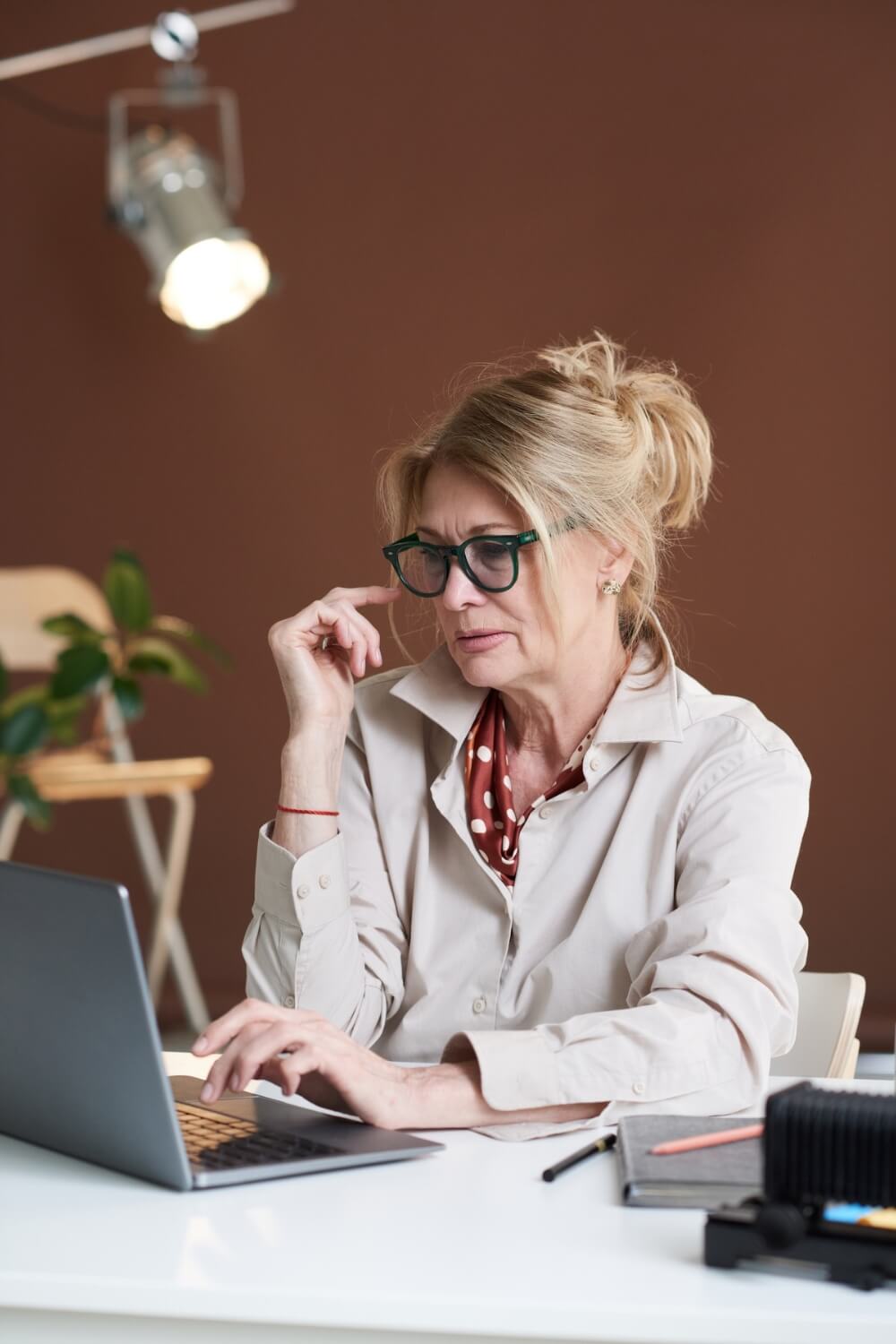 Therapist working at a laptop