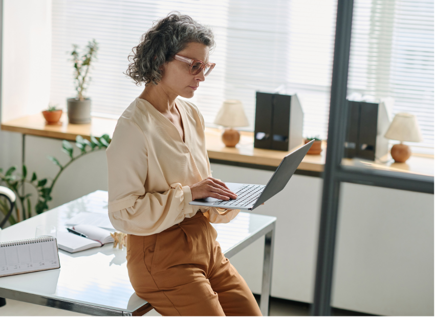 Woman smiling with raised upturned hands